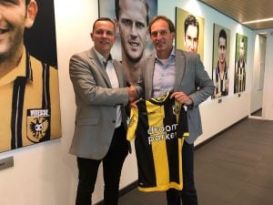 Steve Butchart and Joost de Wit shake hands after agreeing an extension to Inspiresports exclusive agreement with Vitesse Arnhem